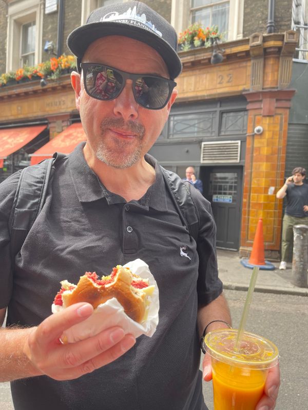 Man eating a sandwich.