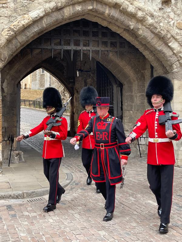 Yeoman Warder and King's Guards at the Tower of London.
