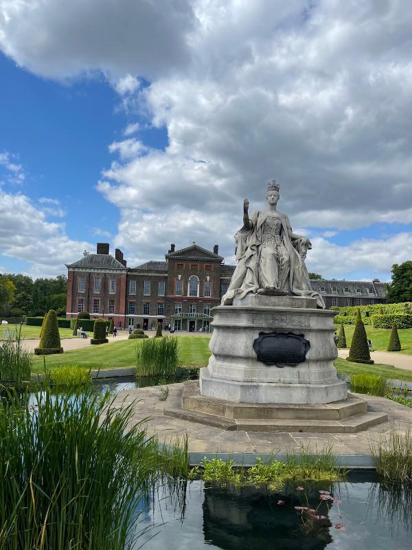 Visiting Kensington Palace and gardens.