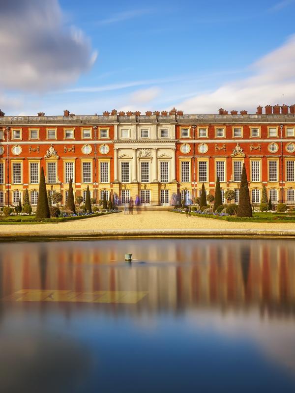 How to get to Hampton Court Palace which is shown in this image of the palace and the pond.