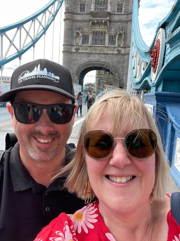Man and woman on Tower Bridge in London.