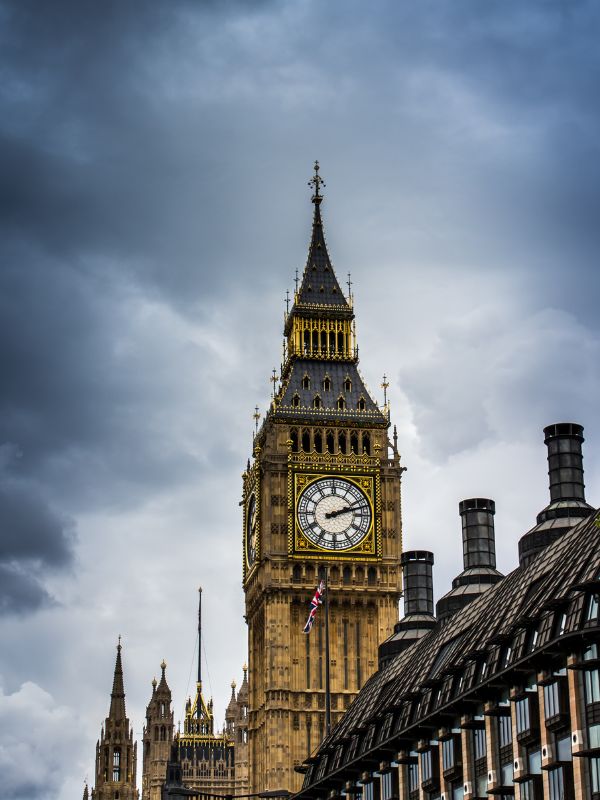 Big Ben in London with a brooding sky.