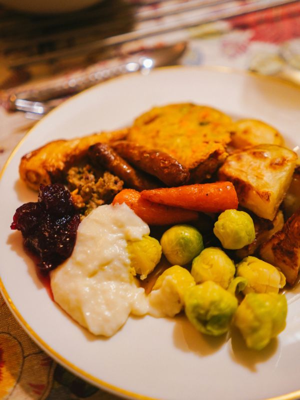 Christmas lunch with brussels sprouts, carrots, parsnips, roast potatoes.