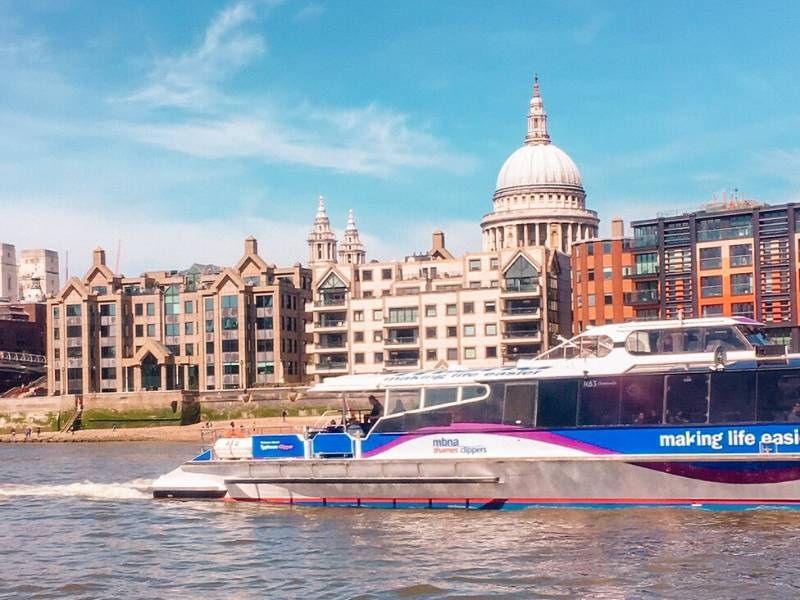 Boat on the Thames with St Paul's Cathedral in the background