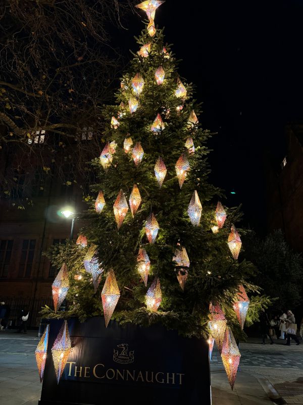 The Connaught hotel's Christmas tree in Carlos Place, Mayfair, hung with glowing lanterns.