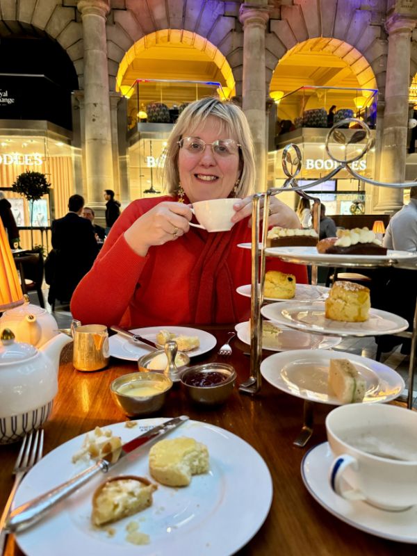 Tracy having afternoon tea at Fortnum and Mason in the Royal Exchange, London