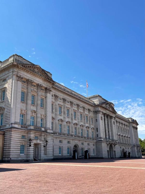 Visiting Buckingham Palace in London with flag flying showing the King is at home.