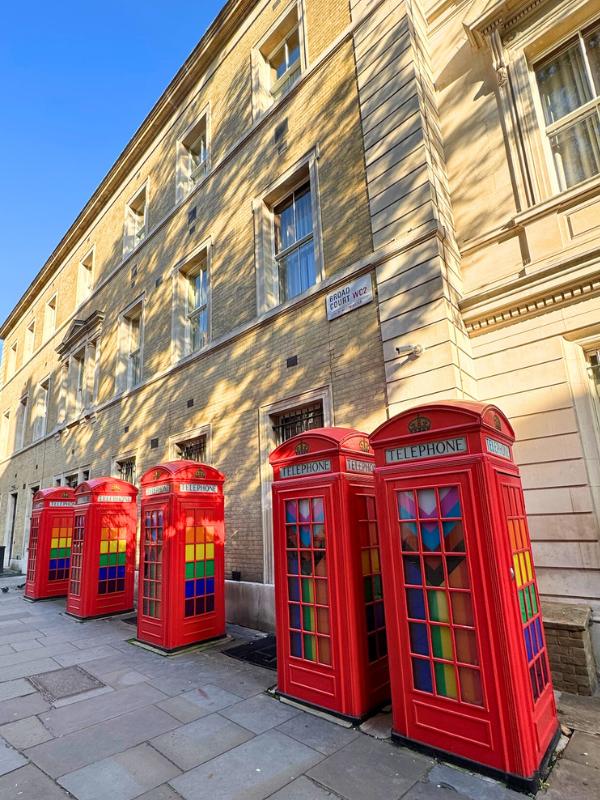 Row of red phone boxes.