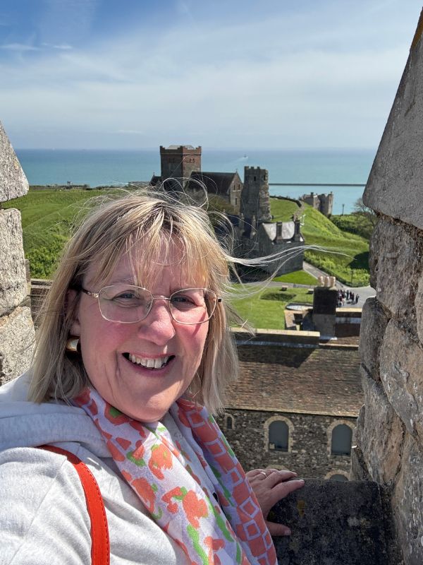 Tracy at Dover Castle with views over the Channel on an English Bus day tour from London