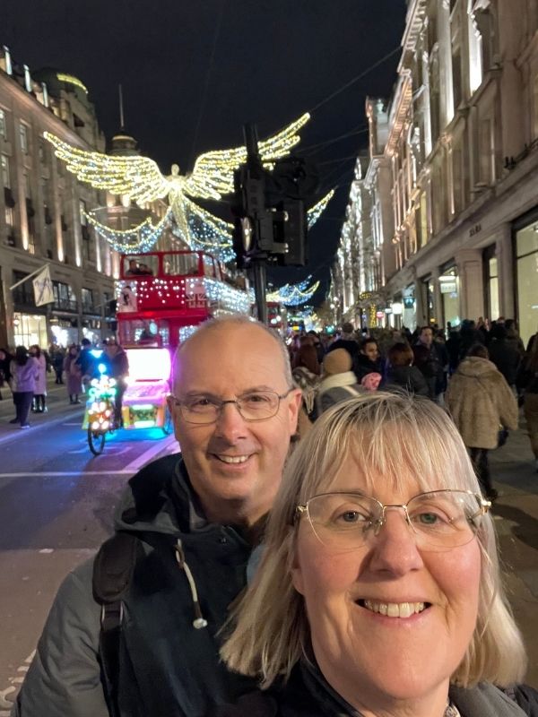 Tracy and Doug Collins under the Regent Street Christmas lights in London