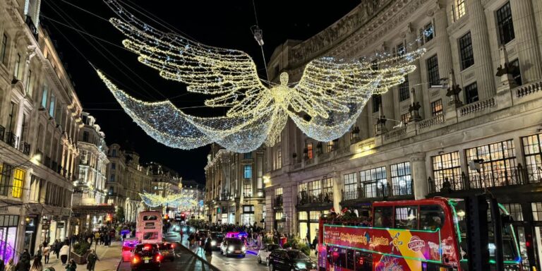 Christmas angel lights over a busy Regents Street at Christmas in London