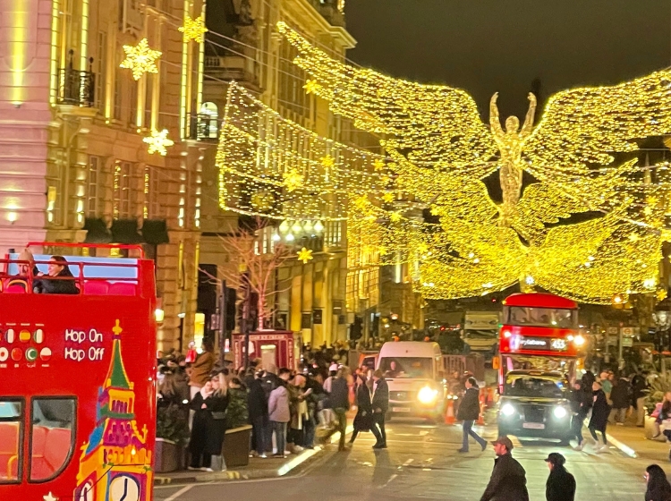 Events in London in December: Regent Street's Christmas angel lights above a red London bus