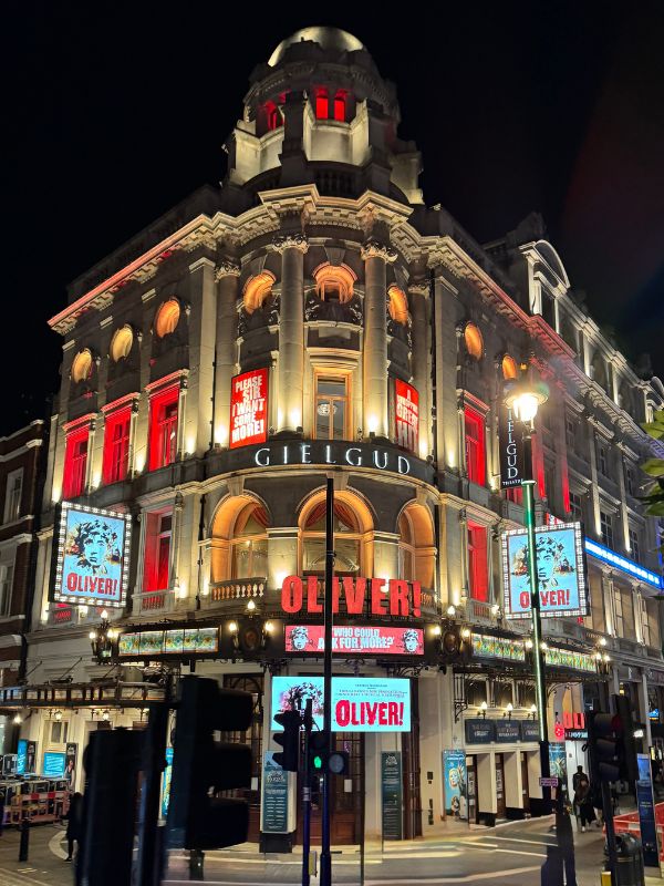 The Gielgud Theatre on Shaftesbury Avenue lit up at night