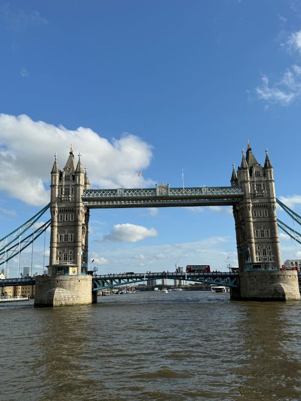 Tower Bridge over the Thames seen from the river on a sunny day