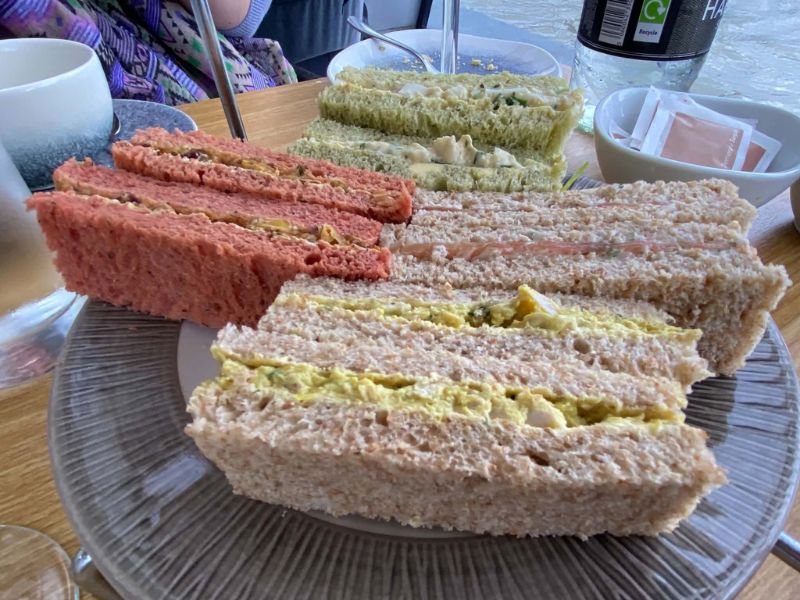Colourful finger sandwiches served on the afternoon tea cruise in London