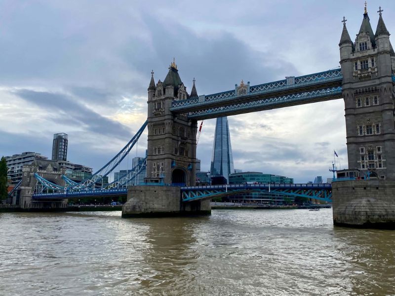 Tower Bridge viewed head-on from the River Thames with the Shard behind